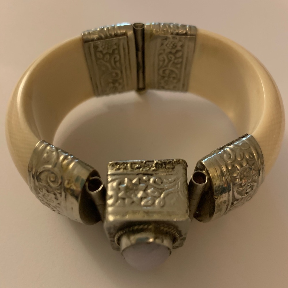 Ivory and silver bracelet with stone.